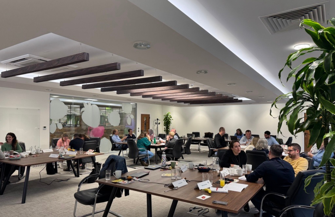 alt="employees under management training"