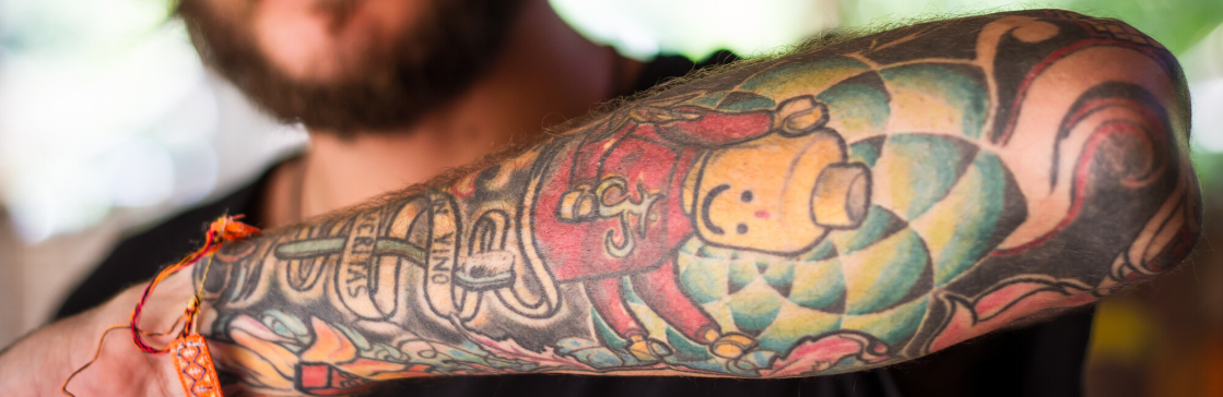 Can I refuse a candidate on the basis of their visible tattoos?